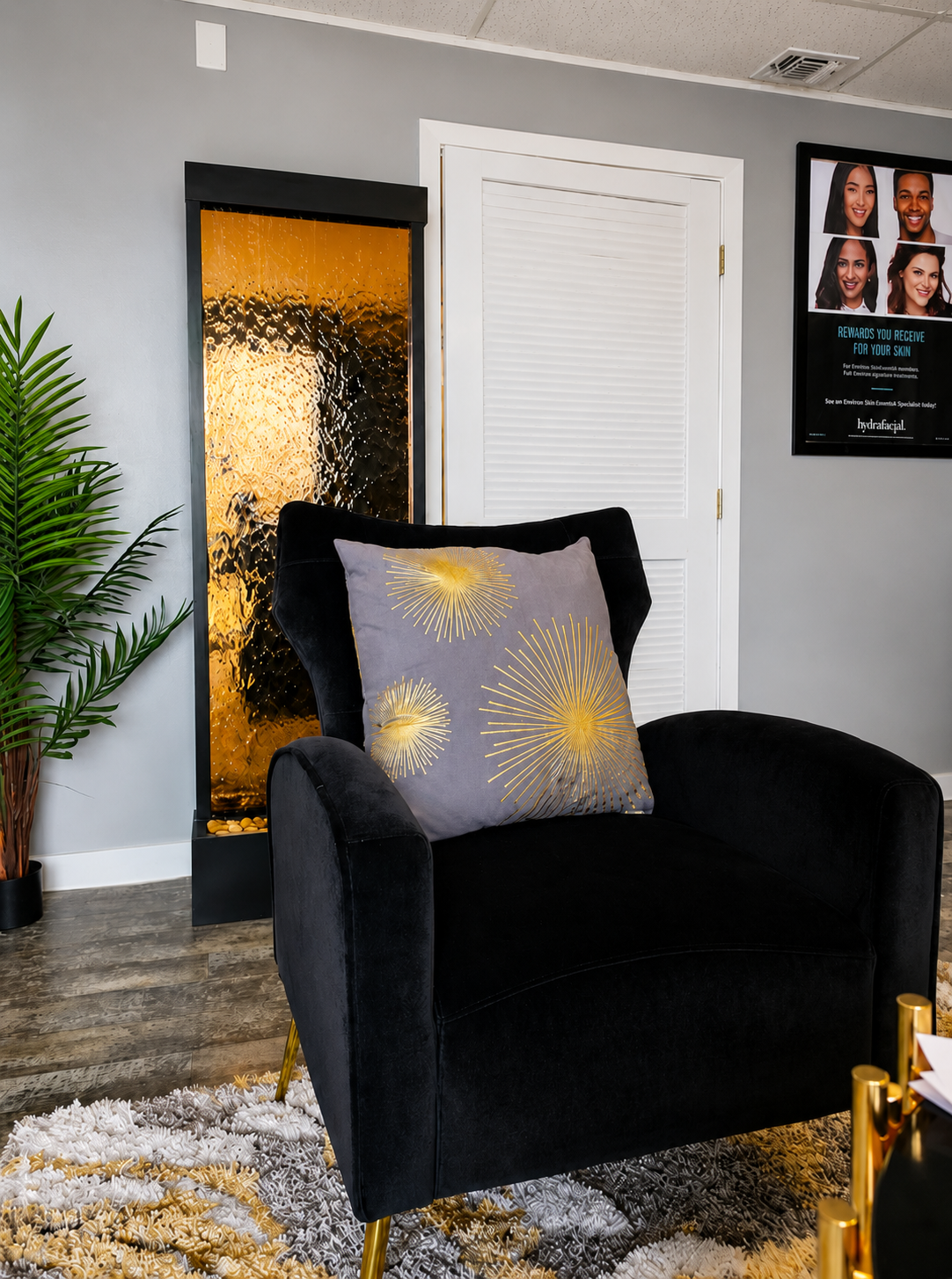 black and gold decor with black and gold wall fountain