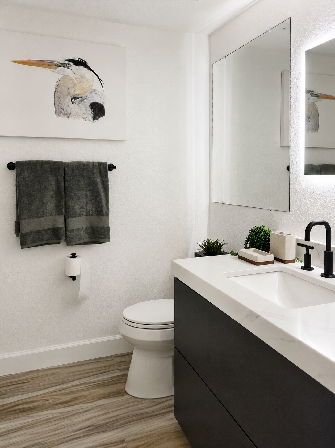contemporary style beach condo primary bath with custom black floating vanity and quartz countertops